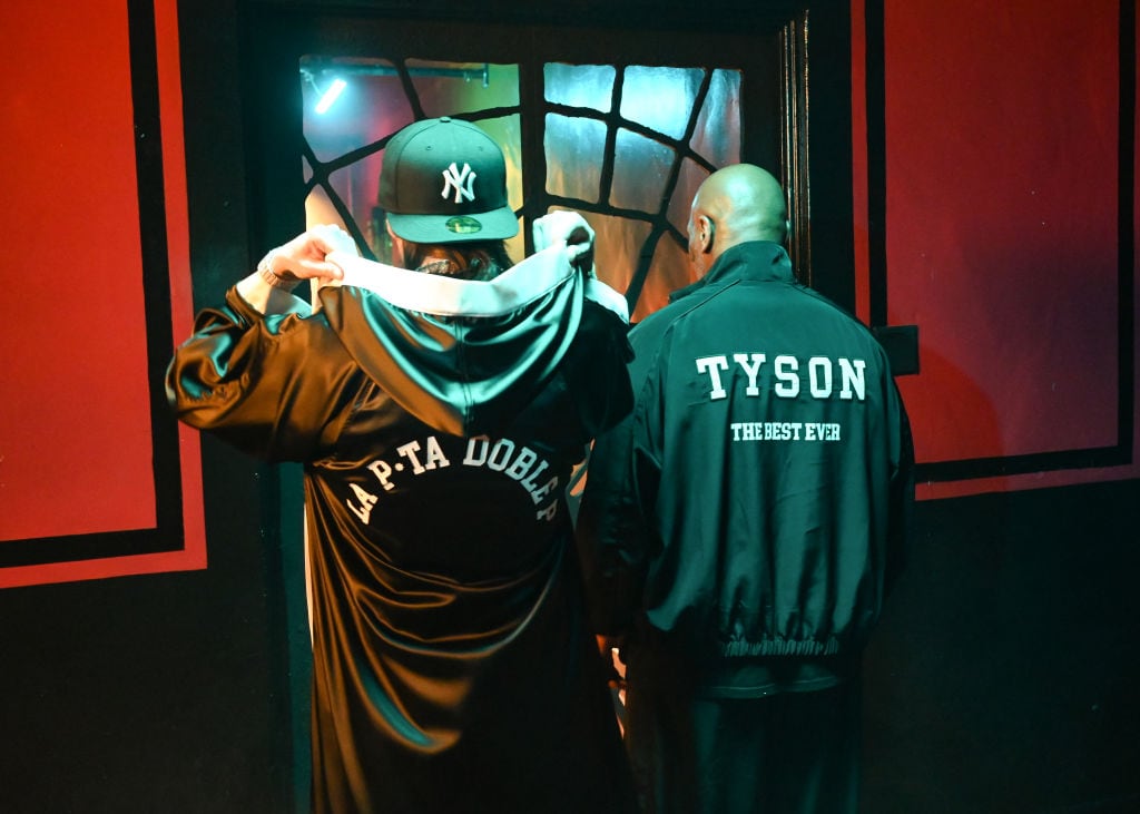 Peso Pluma and Mike Tyson at the 2023 Billboard Music Awards on November 19 at The Mayan in Los Angeles, California. (Photo by Gilbert Flores/Penske Media via Getty Images)