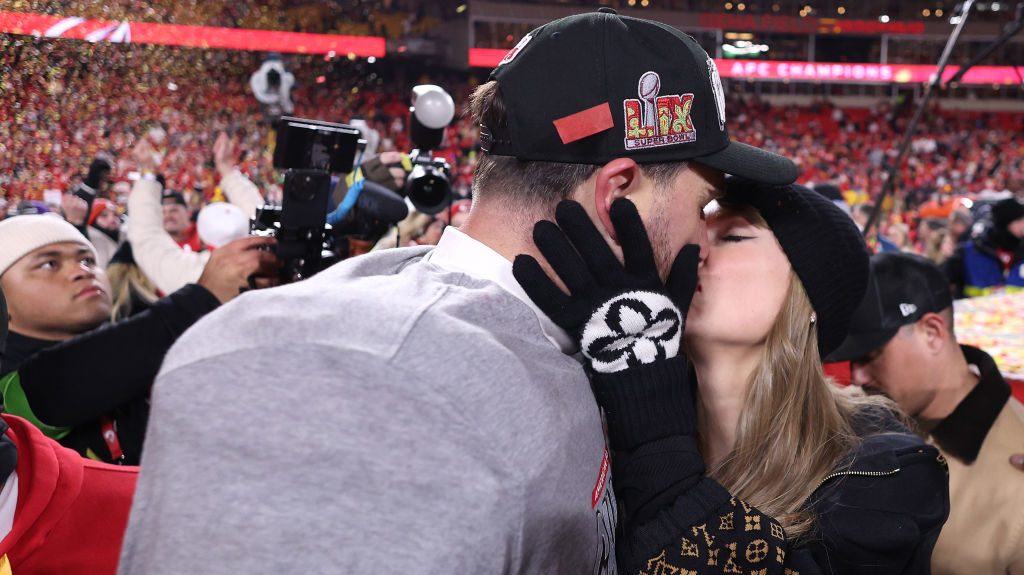 Taylor Swift and Travis Kelce's Iconic Kiss Celebrating Chiefs Making Super Bowl