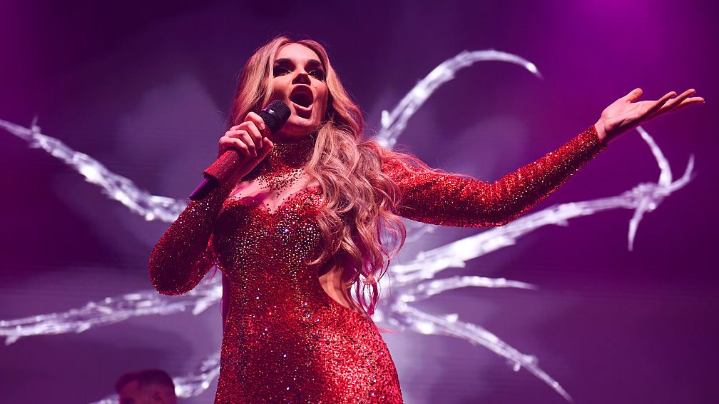 Melody performs on stage during the London Eurovision Party