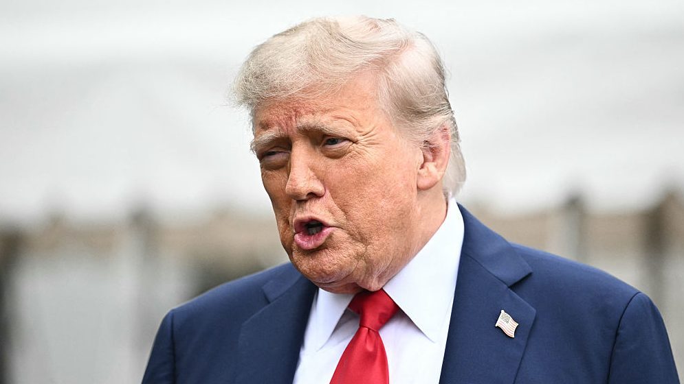 US President Donald Trump speaks to journalists as he makes his way to board Marine One before departing from the South Lawn of the White House