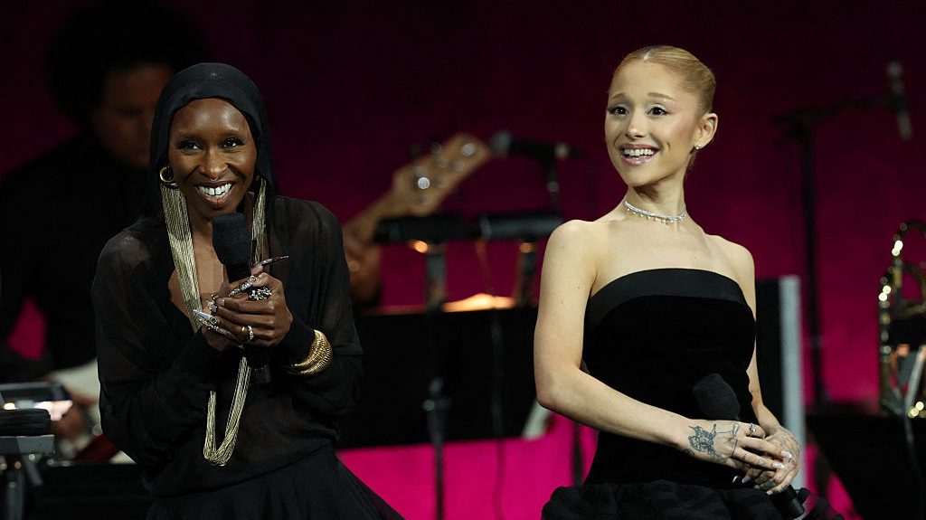 Cynthia Erivo (L) and Ariana Grande speak onstage about "Wicked: For Good" during the CinemaCoN 2025 Universal Pictures and Focus Features presentation at The Colosseum at Caesars Palace in Las Vegas, Nevada on April 2, 2025. (Photo by VALERIE MACON / AFP