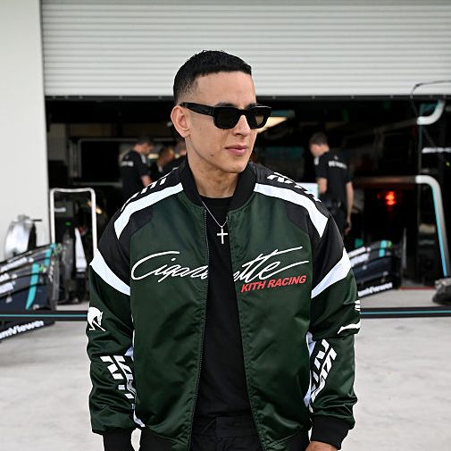 Daddy Yankee poses for a photo in the Pitlane during previews ahead of the F1 Grand Prix of Miami