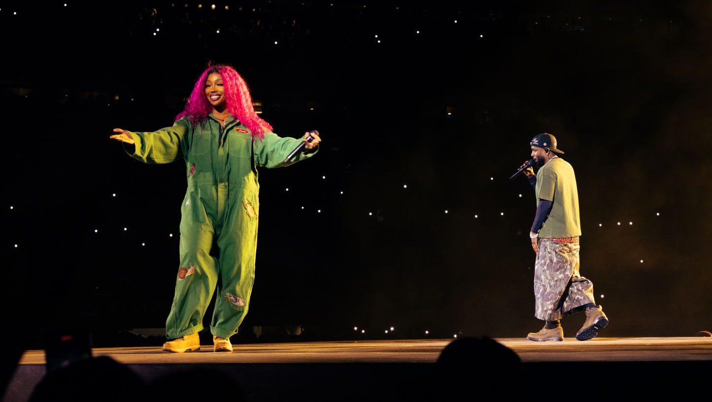 SZA and Kendrick Lamar performing at the Grand National Tour