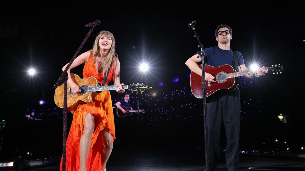 Taylor Swift and Jack Antonoff perform onstage during "Taylor Swift | The Eras Tour" at Wembley Stadium on August 20,