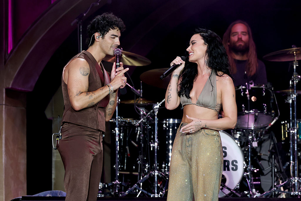 Joe Jonas and Demi Lovato perform onstage during the Jonas Brothers: JONAS20 Greetings From Your Hometown tour kick off at Met Life Stadium on August 10, 2025 in East Rutherford, New Jersey