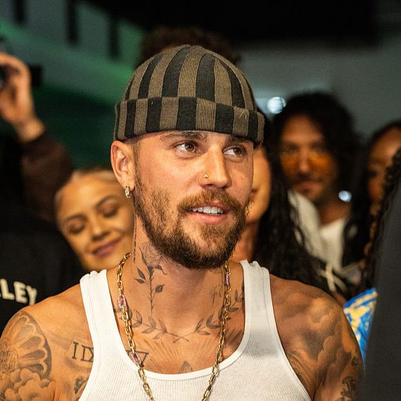 Justin Bieber smiles on the court at "The League" on August 28, 2025