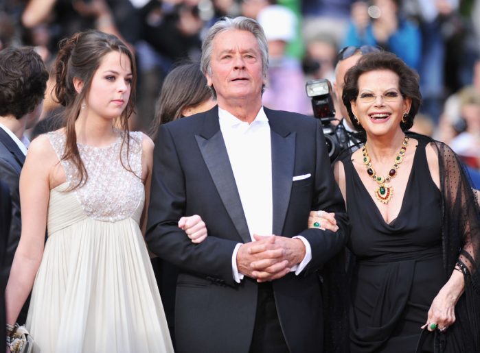 Actress Claudia Cardinale, actor Alain Delon, Anouchka Delon attend the "IL Gattopardo" Premiere at the Palais des Festivals during the 63rd Annual Cannes Film 