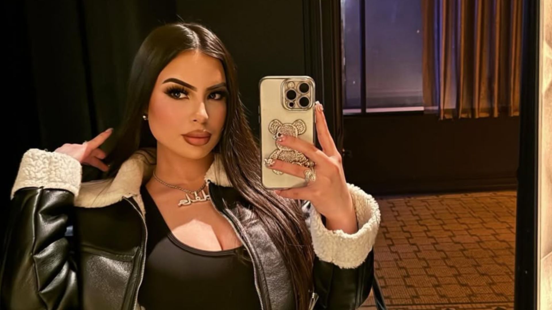 DELAROSA takes a selfie for an Instagram post