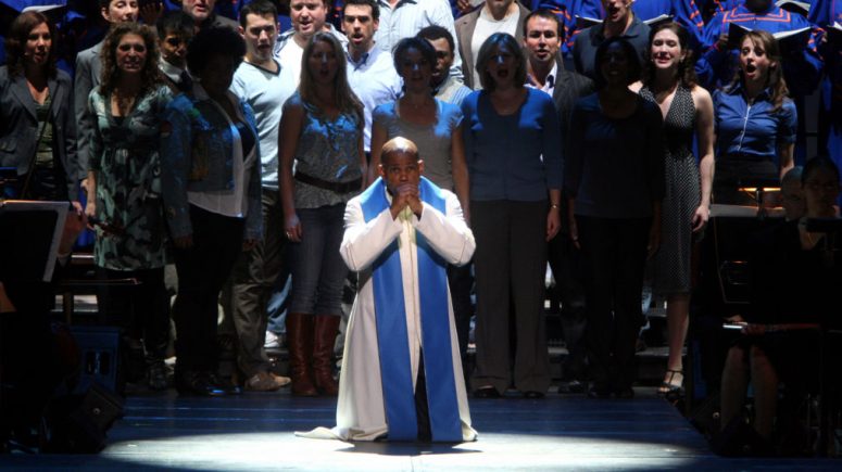 Baltimore Symphony Orchestra in Leonard Bernstein's "Mass" at Carnegie Hall on Friday night, October 24, 2008.The orchestra was joined by Street Chorus, Morgan State University Choir, Brooklyn Youth Chorus and Stony Brook University Marching Band.This image;Jubilant Sykes, in white, as Celebrant. (Photo by Hiroyuki Ito/Getty Images)