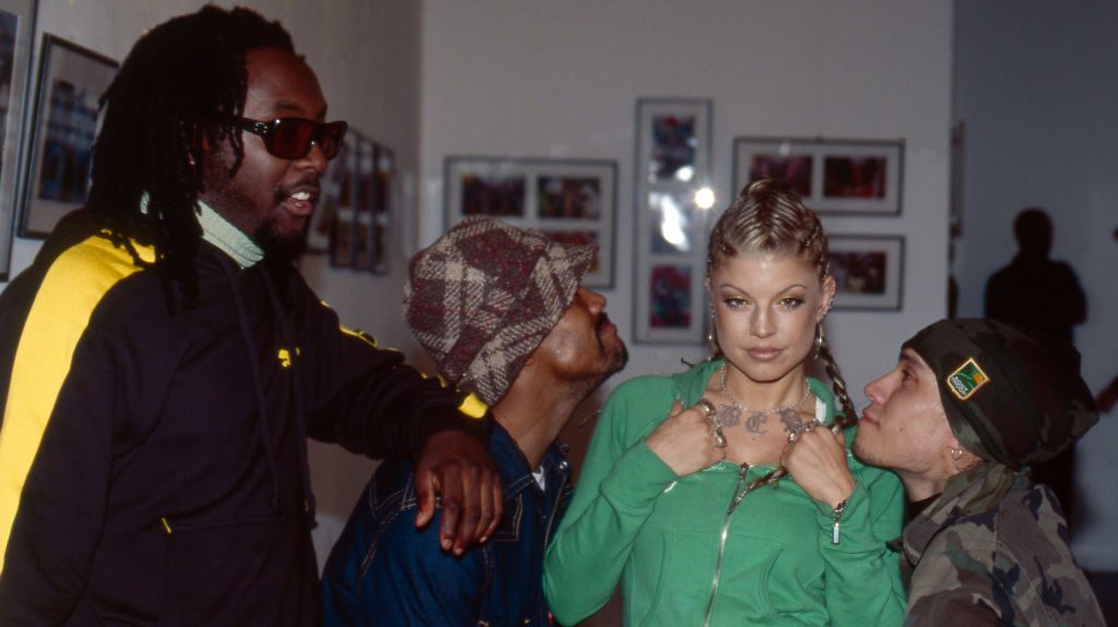 Black Eyed Peas back stage at TV show, London, circa 2003. Left to right: will.i.am (William Adams), apl.de.ap (Allan Pineda), Fergie (Stacy Ferguson) and Taboo