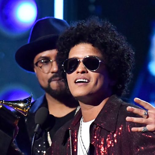Bruno Mars (C) accept the award for Album of the Year onstage during the 60th Annual GRAMMY Awards at Madison Square Garden on January 28, 2018 in New York City. (Photo by Jeff Kravitz/FilmMagic)